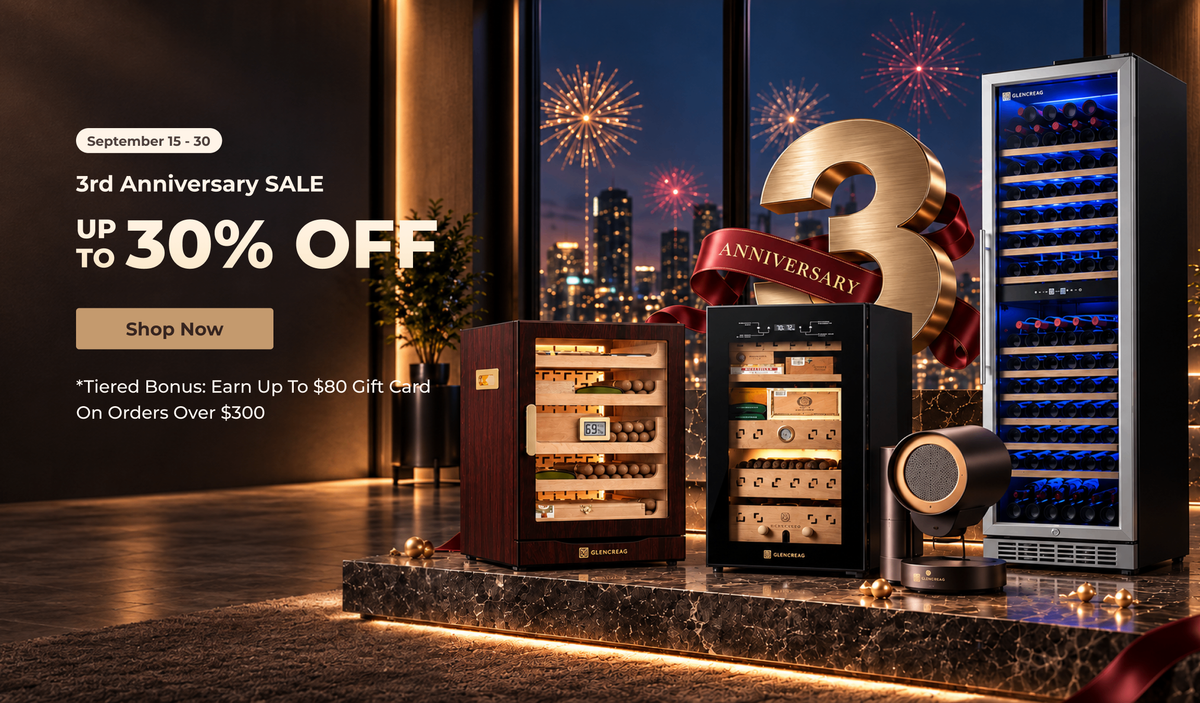 Three wine coolers displayed on a marble counter in a modern room with a city skyline and fireworks in the background. Promotional text on the left reads '3rd Anniversary SALE UP TO 30% OFF' with a 'Shop Now' button.