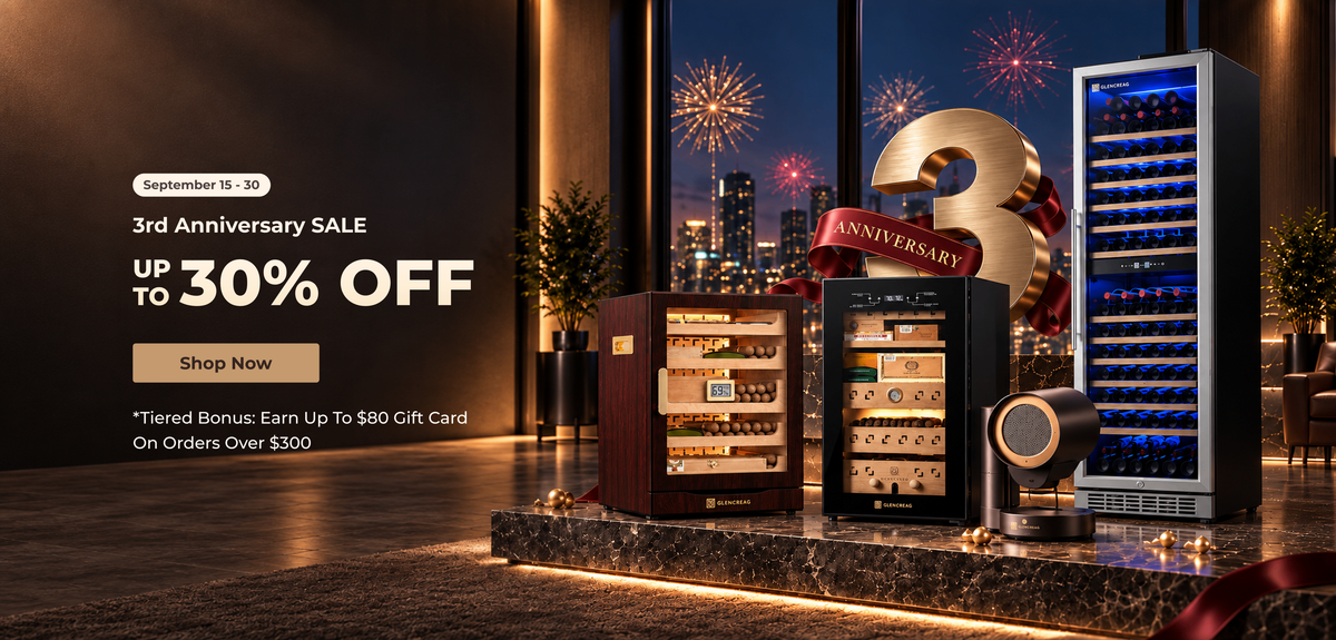 Promotional banner for a wine and beverage storage system set in a luxury modern home. The set includes a large wine refrigerator on the right with blue-lit shelves, a wooden wine cabinet in the middle-left, a smaller black beverage cooler in the center, and a circular speaker on the right.