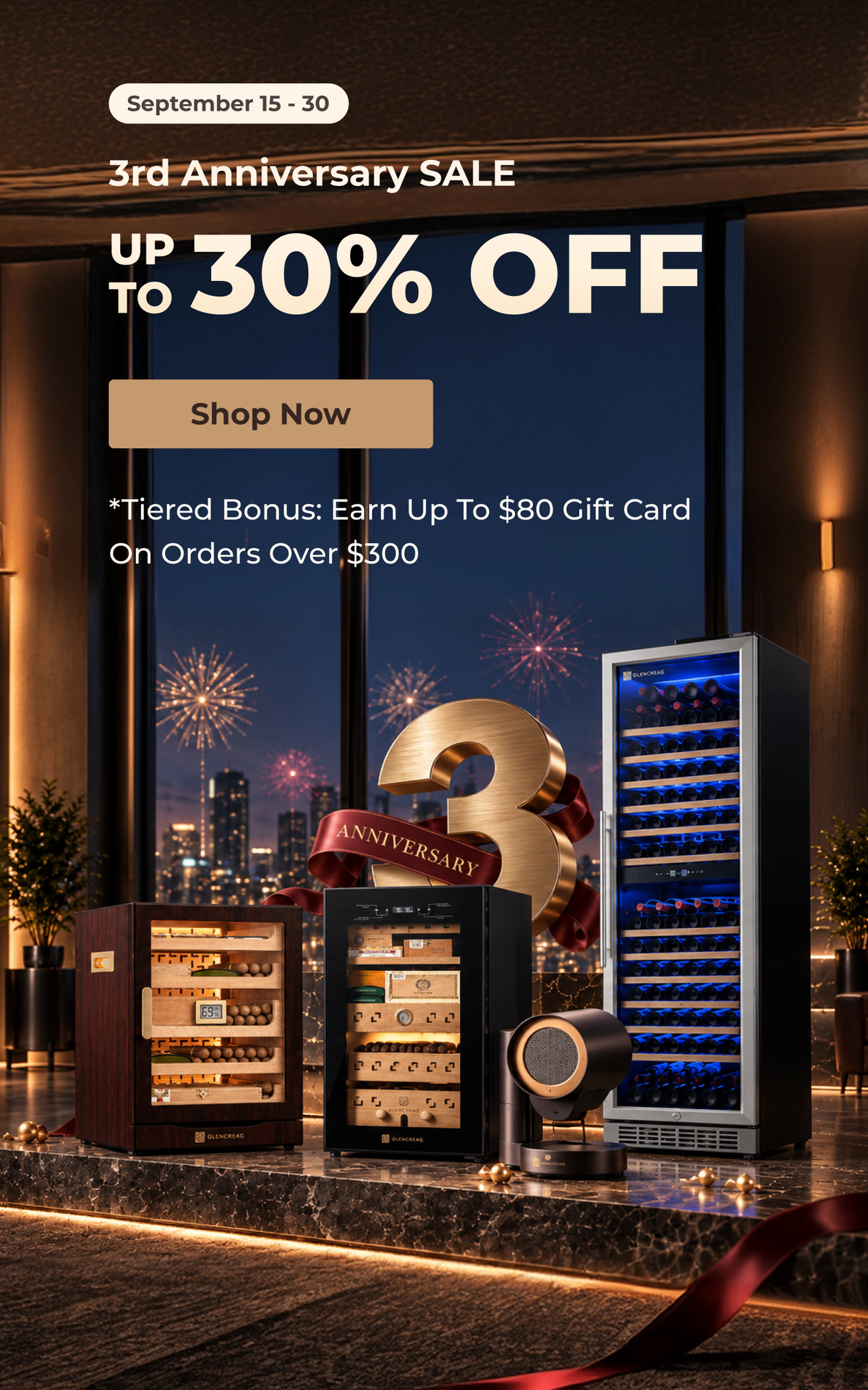 Promotional sale graphic for a 3rd Anniversary sale with up to 30% off, showing multiple beverage and storage appliances on a countertop in a modern kitchen setting with city skyline and fireworks in the background. Visible products include a wine refrigerator, a wine cooler, a small appliance, and a speaker, with large sale text and a 'Shop Now' button.
